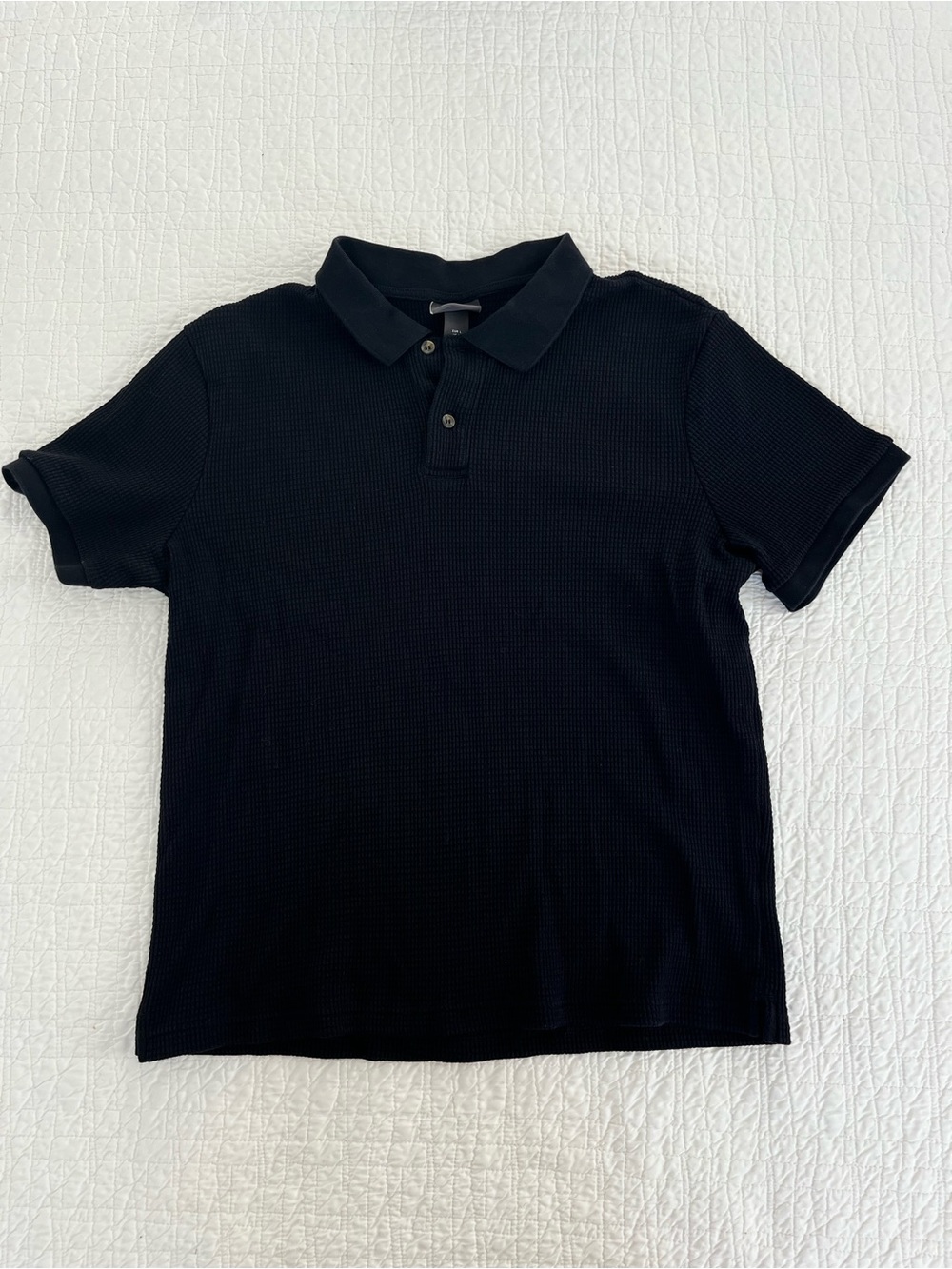 Black H&M polo shirt with subtle textured weave size L